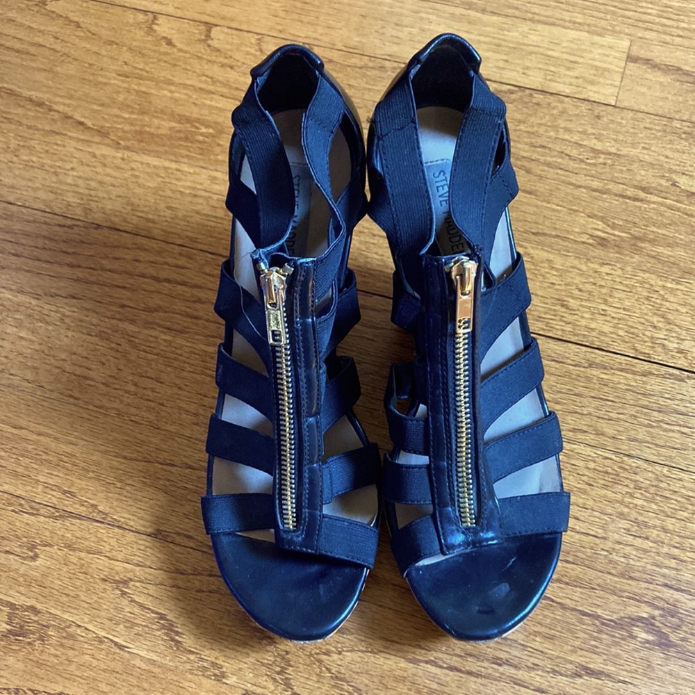 Steve Madden black heels. Zipper on the top of the shoe. Size 8.5.